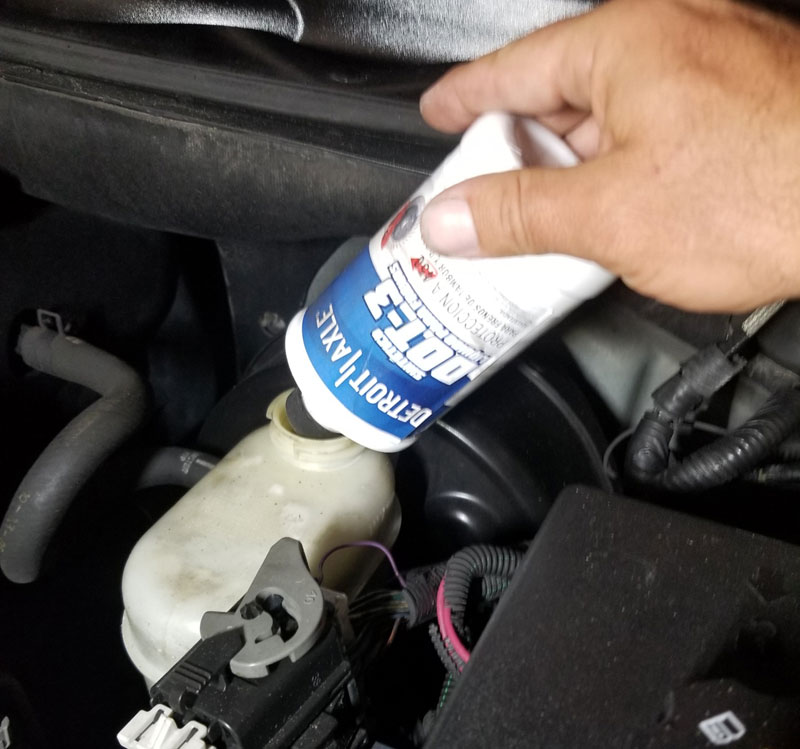 adding brake fluid to vehicle