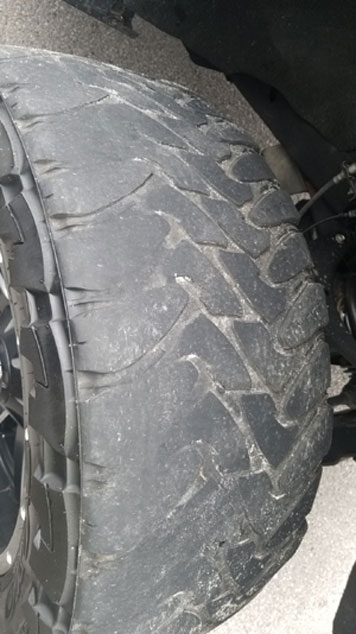 cupped tire tread