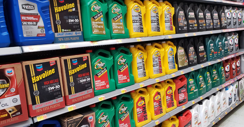 vehicle oil bottles on store shelves