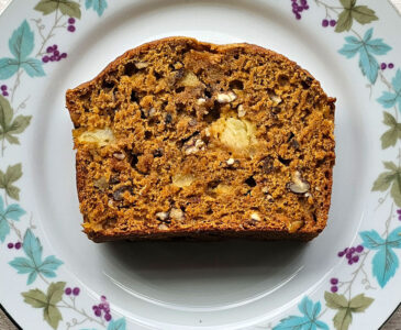 A slice of sweet potato bread on a plate.