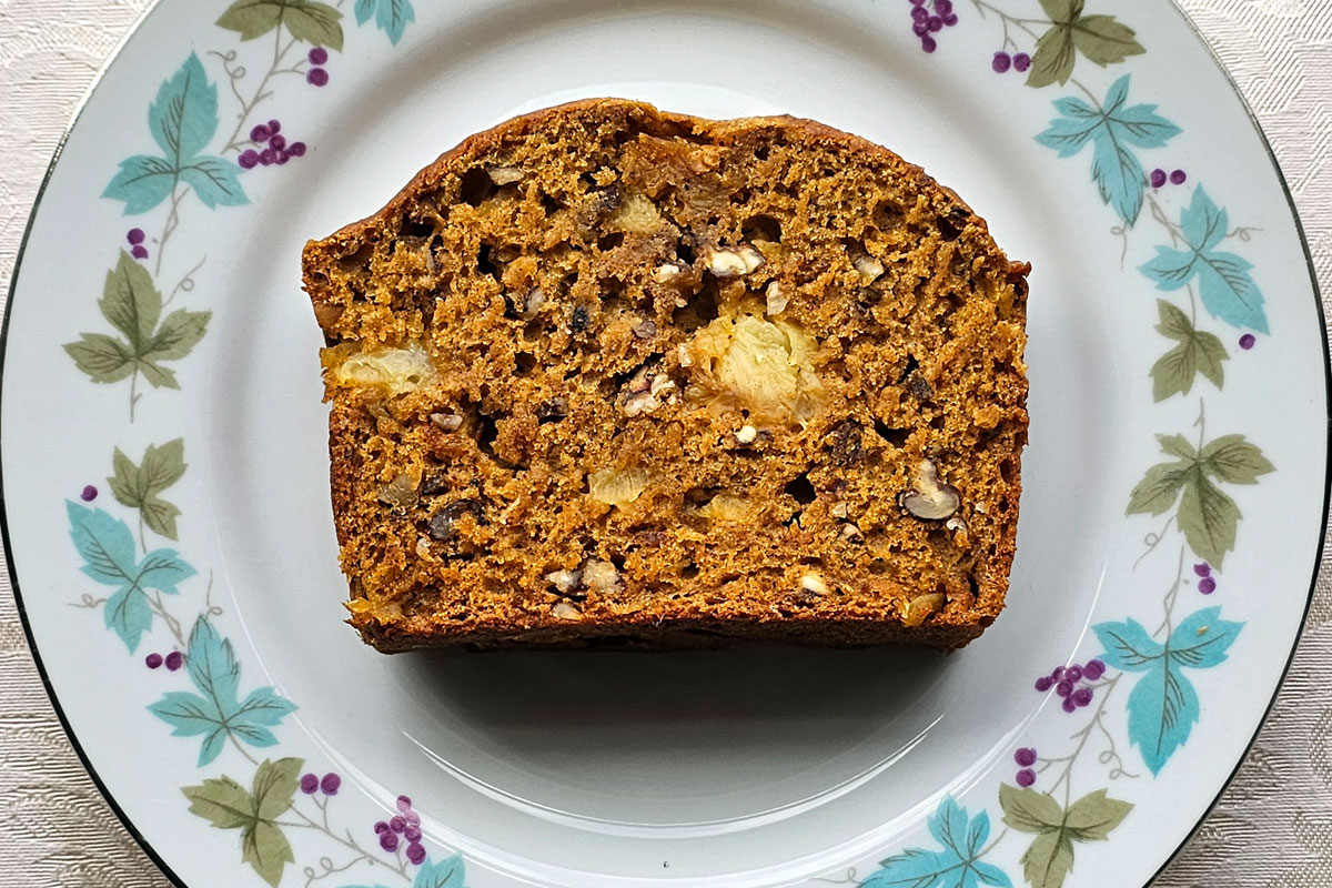 A slice of sweet potato bread on a plate.