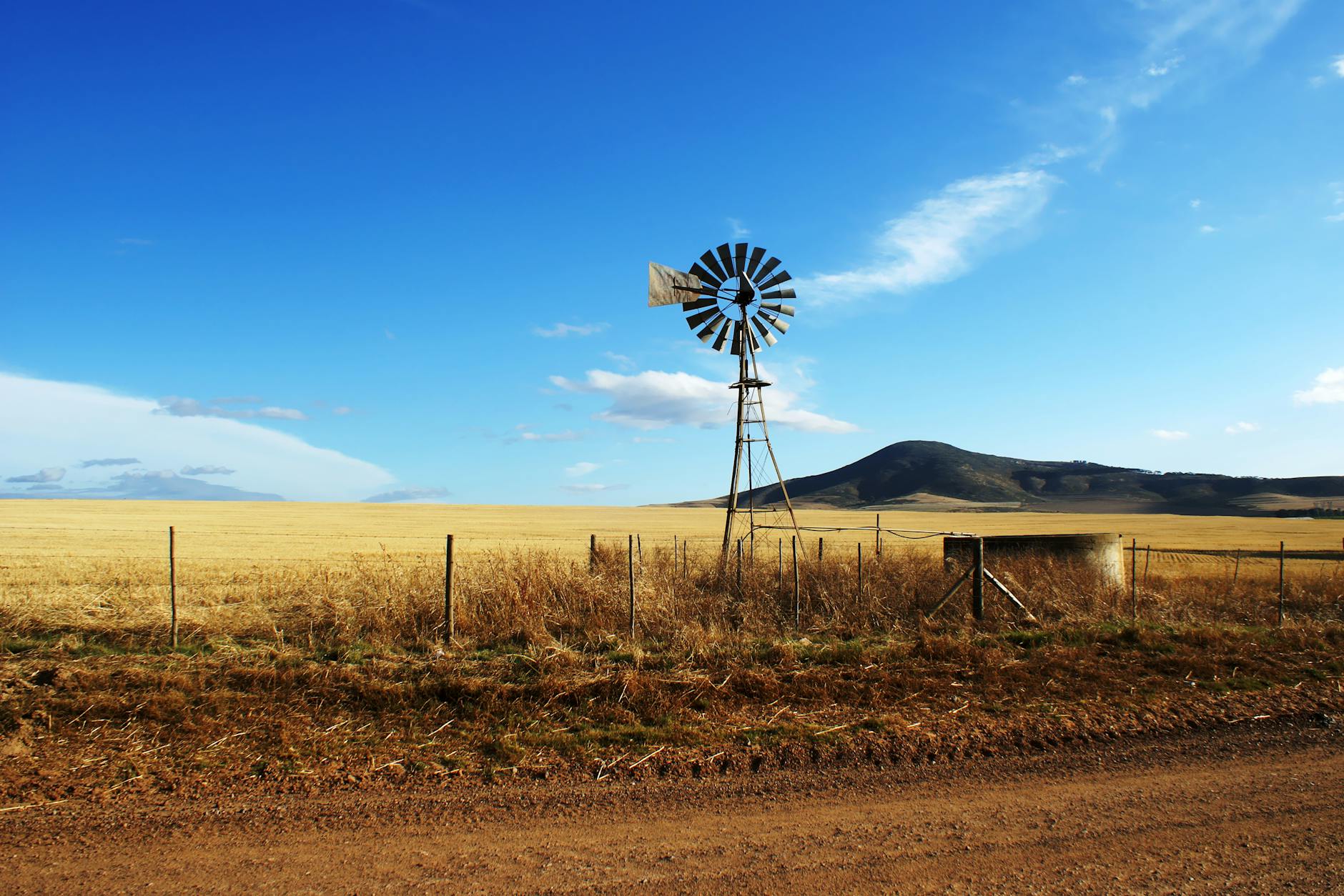 brown and black wooden wind mill